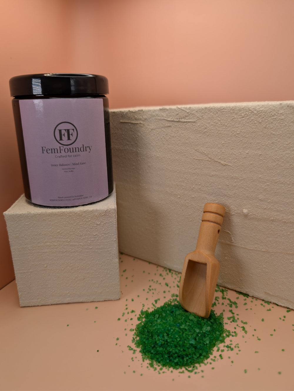 Calm Restore Bath Salts in an amber jar with pastel label, promoting a gentle, calming bathing experience.